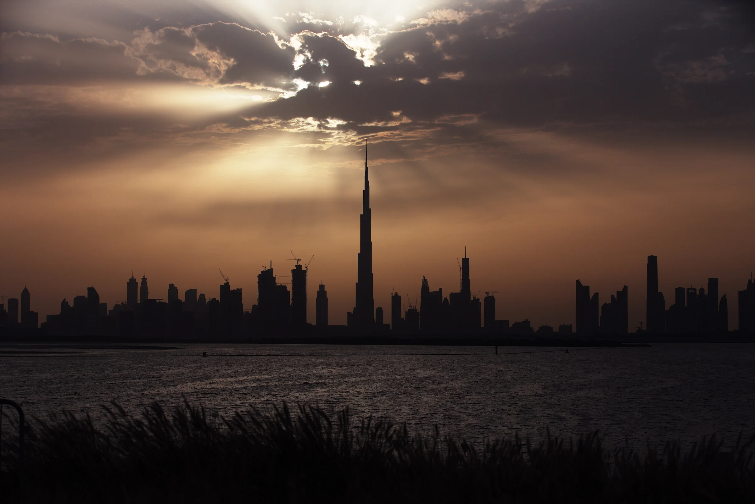 Dubai skyline at golden hour, the Burj Khalifa above the city